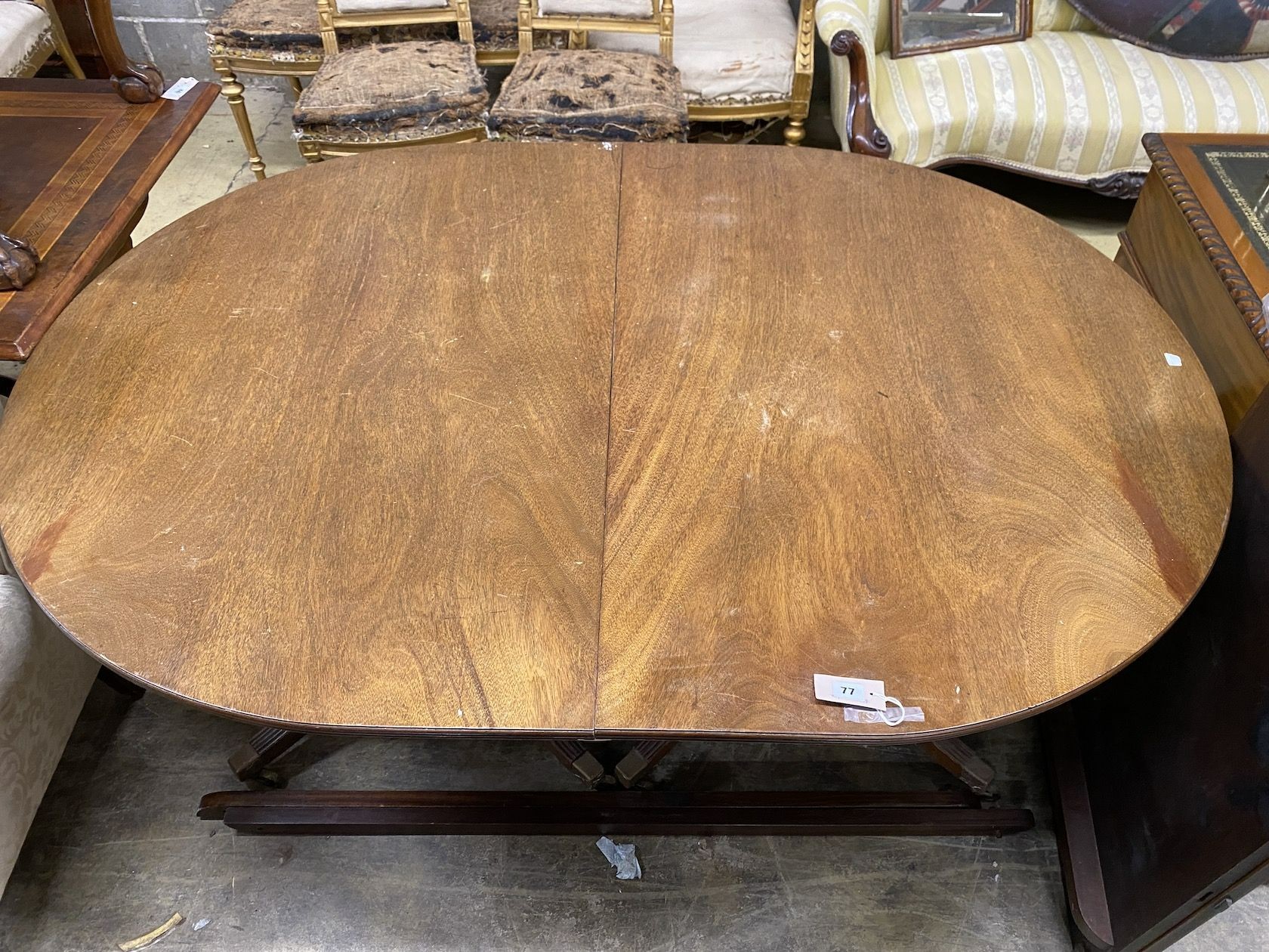 A George III style mahogany twin pedestal D end extending dining table, length 158cm, 248cm extended, two spare leaves, width 110cm, height 72cm